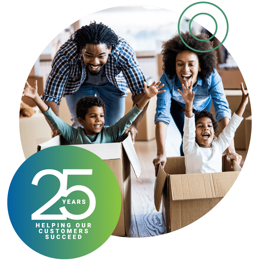 25 years of helping our customers succeed badge ontop of circle image of family playing with their children in moving boxes