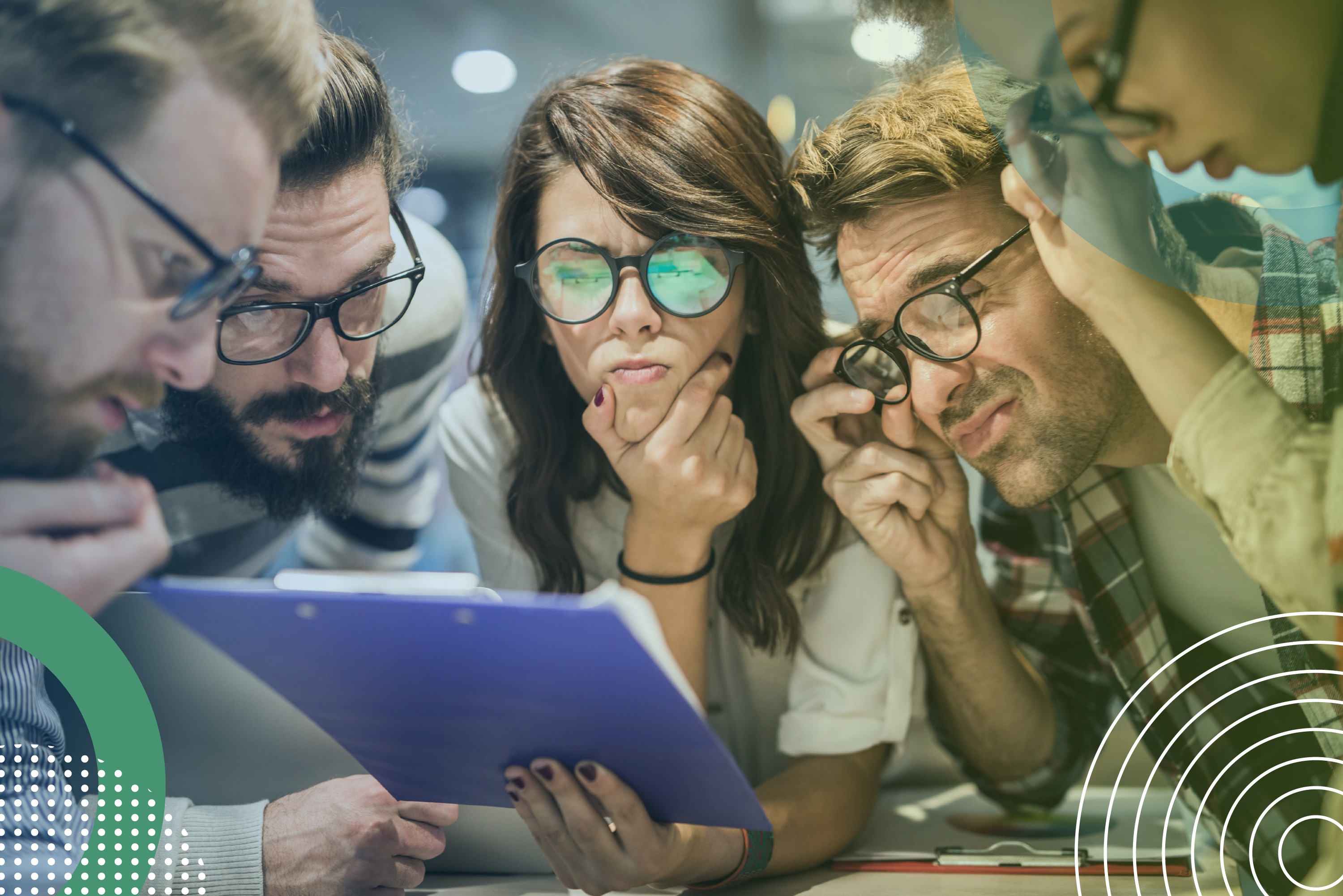 "Group of professionals closely examining a document, representing collaborative planning for digital transformation.